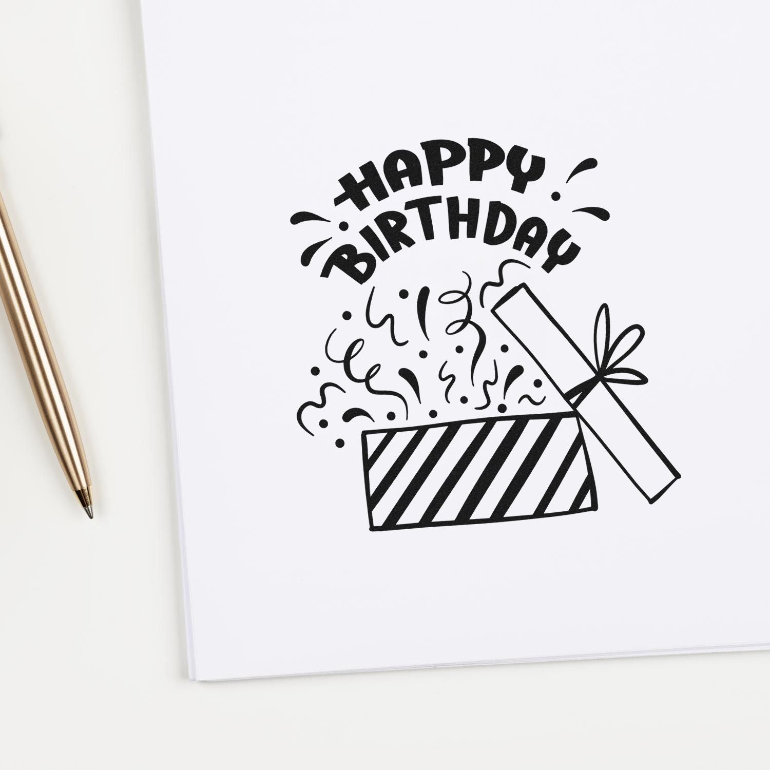 Happy Birthday rubber stamp design with gift box and confetti, ideal for custom birthday cards, packaging, and stationery.