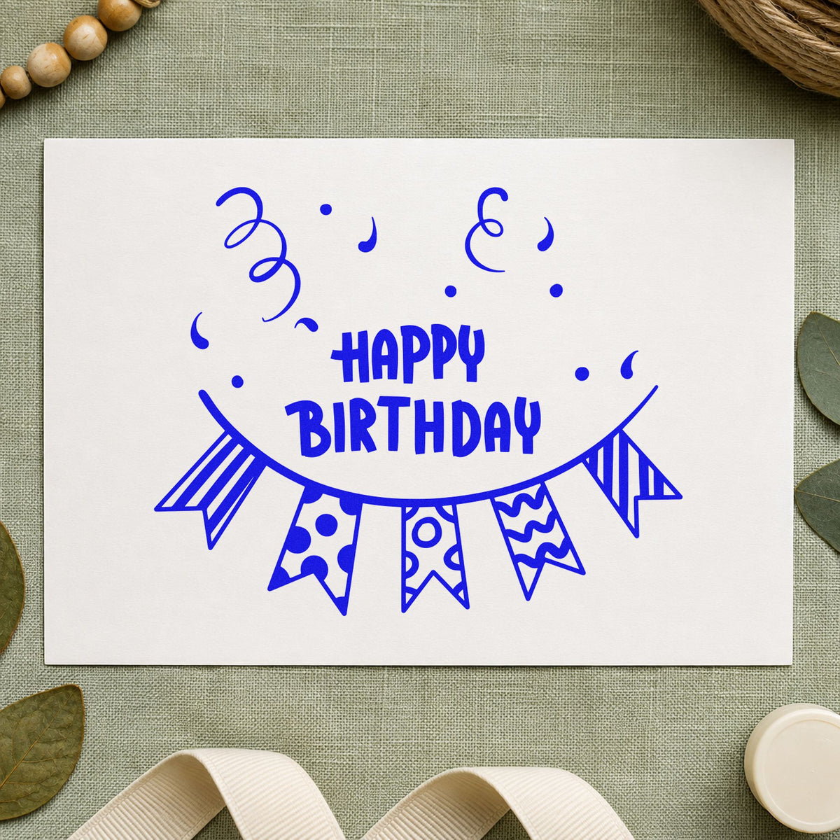 Birthday Patterned Pennant Bunting craft stamp imprinted in blue ink on paper, a design suited to framed day room.