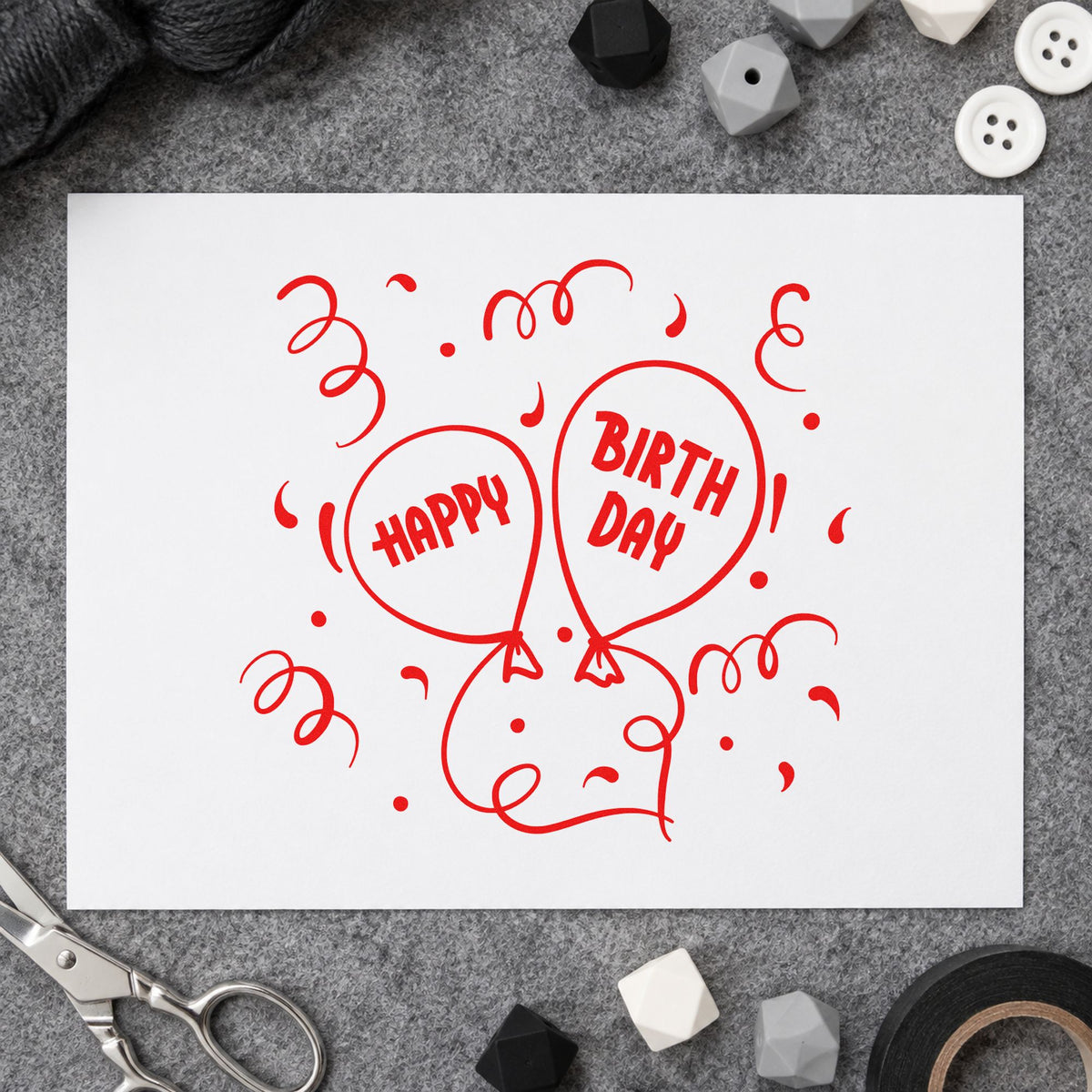 Happy Birthday Balloon Pair rubber stamp shown in red ink, stamped for projects such as bin color labels.