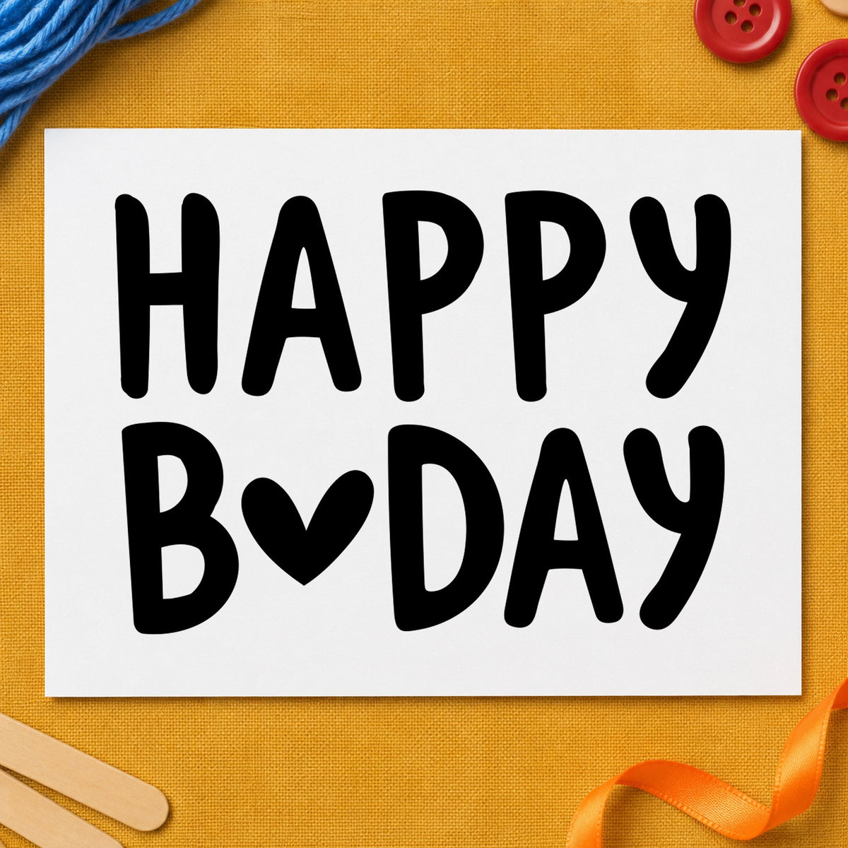 Happy Birthday Heart Letter craft stamp imprint in black ink on a handmade project, one idea being friend gift tags.
