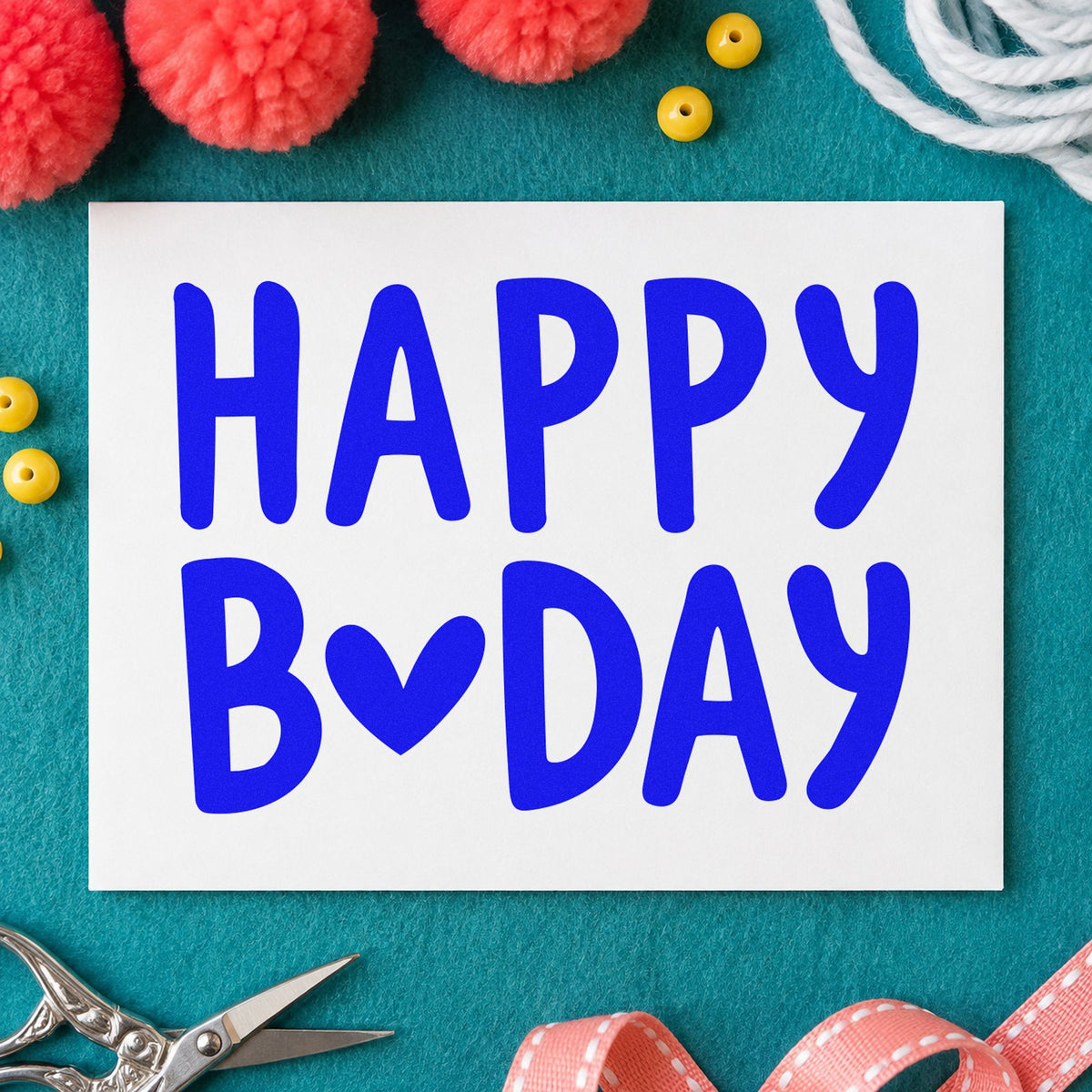 Happy Birthday Heart Letter craft stamp in blue ink on cardstock, an easy option for tote panel printing.