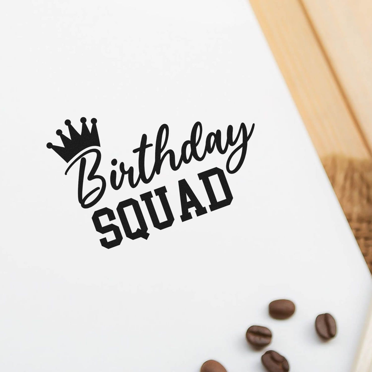 Birthday Squad Crown Script Premium Wooden Stamp - Vintage Pro imprint stamped in black ink. Birthday SQUAD appears with a tilted crown above the script lettering.