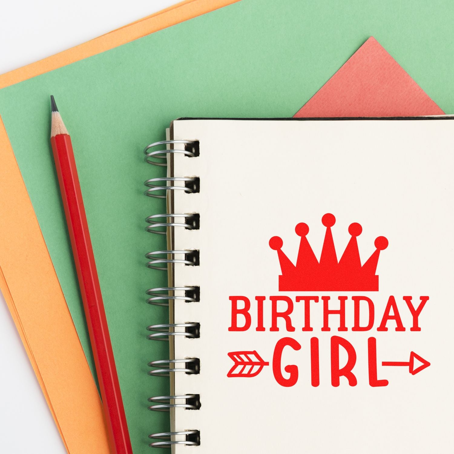 Birthday girl rubber stamp design on notebook, ideal for personalized party crafts, cards, and scrapbooking.