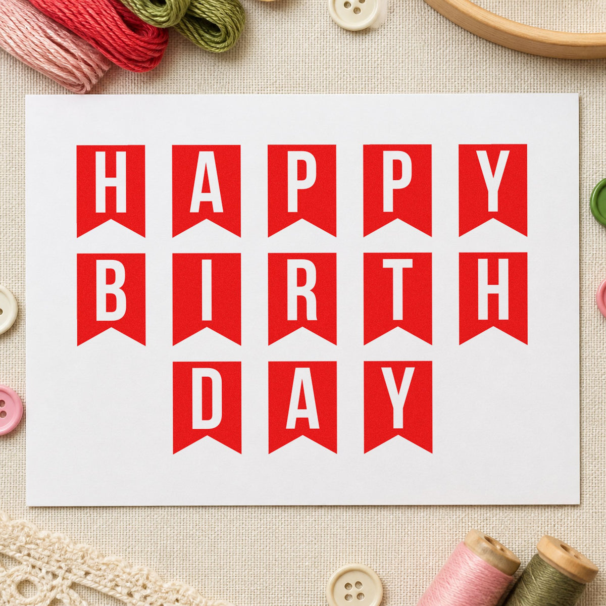 Happy Birthday Pennant Letters craft stamp imprint in red ink on a handmade project, one idea being setup note cards.