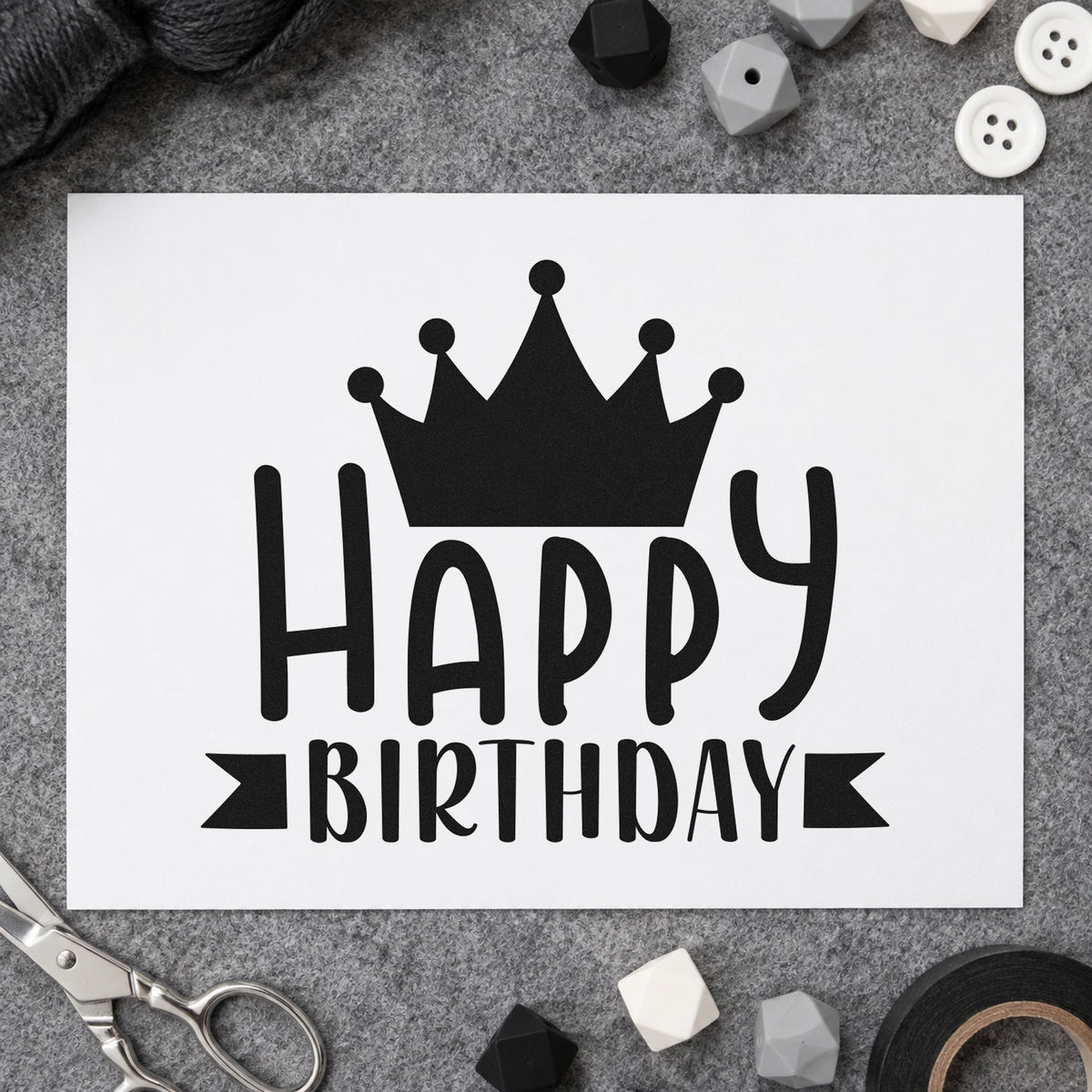 Happy Birthday Crown Banner craft stamp imprint in black ink on a handmade project, one idea being guest gift tags.