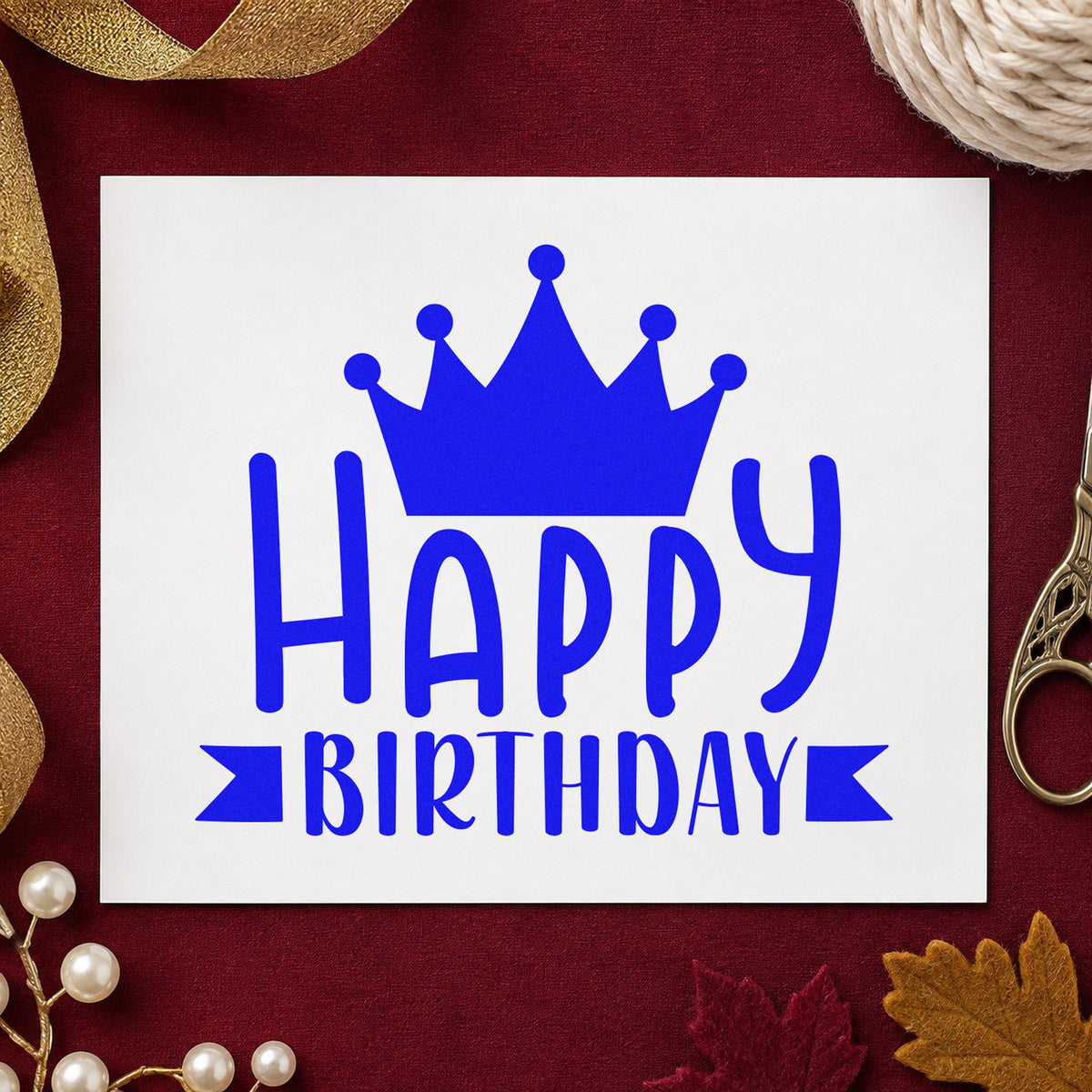 Happy Birthday Crown Banner craft stamp in blue ink on cardstock, an easy option for table runner printing.