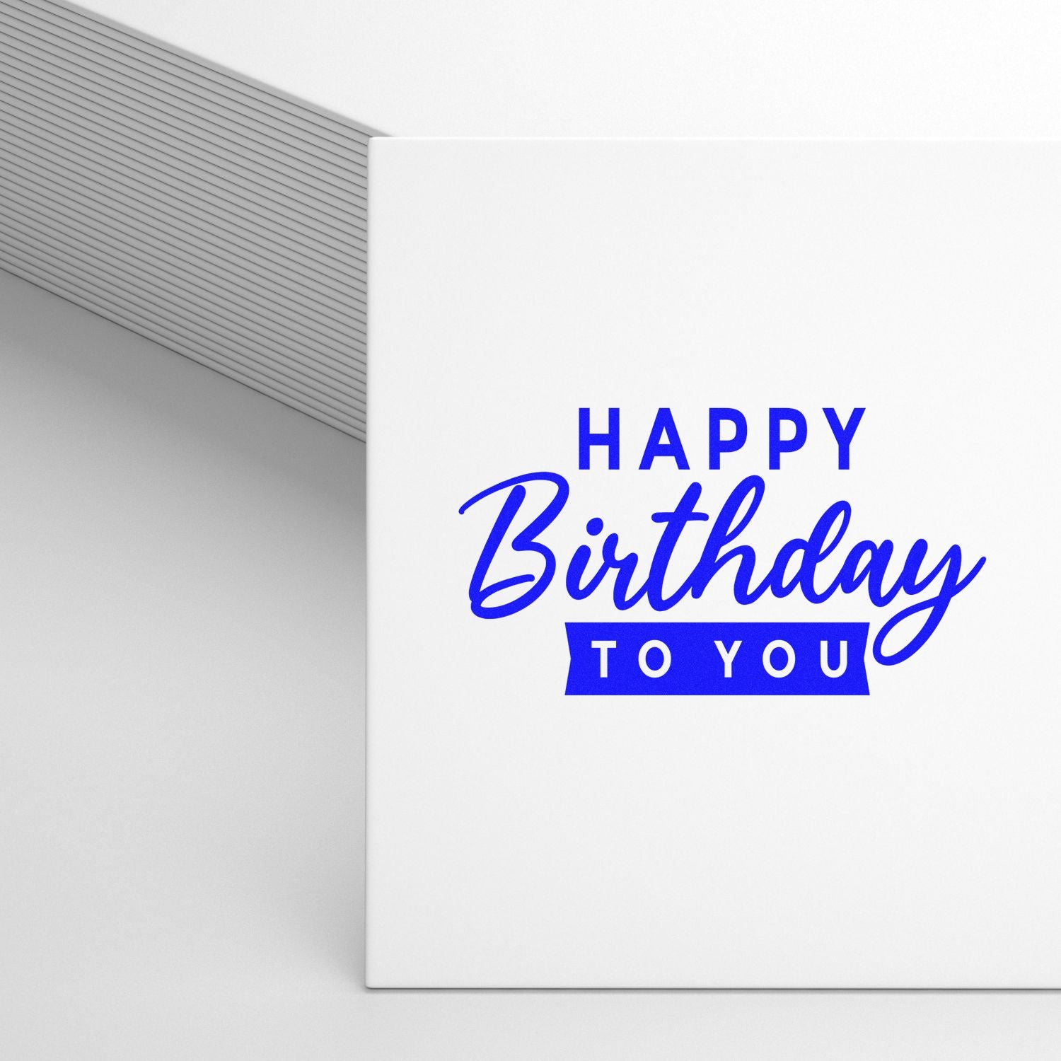 Happy Birthday rubber stamp design on white card, ideal for custom birthday card stamping and party stationery.
