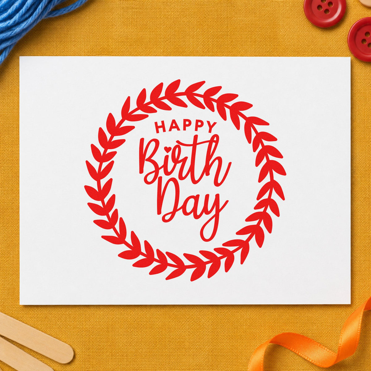 Happy Birthday Leafy Wreath rubber stamp shown in red ink, stamped for projects such as bin outdoor labels.