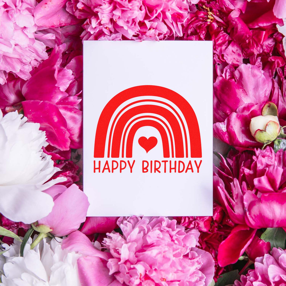 Happy Birthday Heart Rainbow rubber stamp shown in red ink, stamped for projects such as rainbow party album page.
