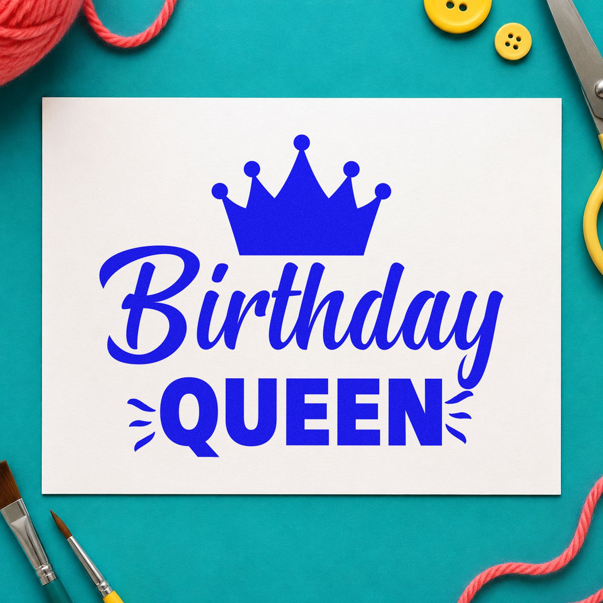 Birthday Queen Crown Graphic craft stamp in blue ink on cardstock, an easy option for tea towel printing.