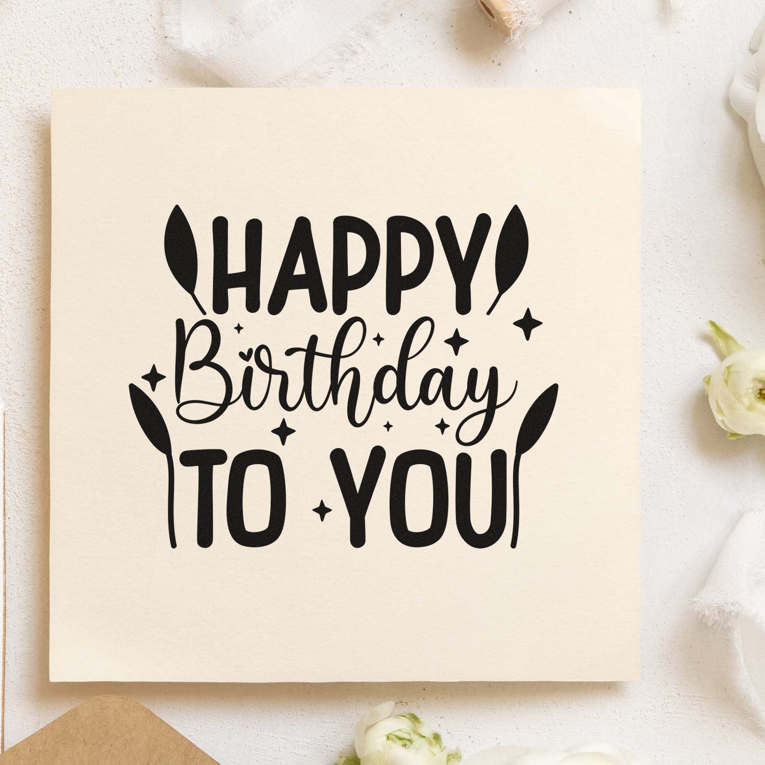 Happy Birthday to You rubber stamp for birthday cards, with bold lettering, leaves, and star accents.