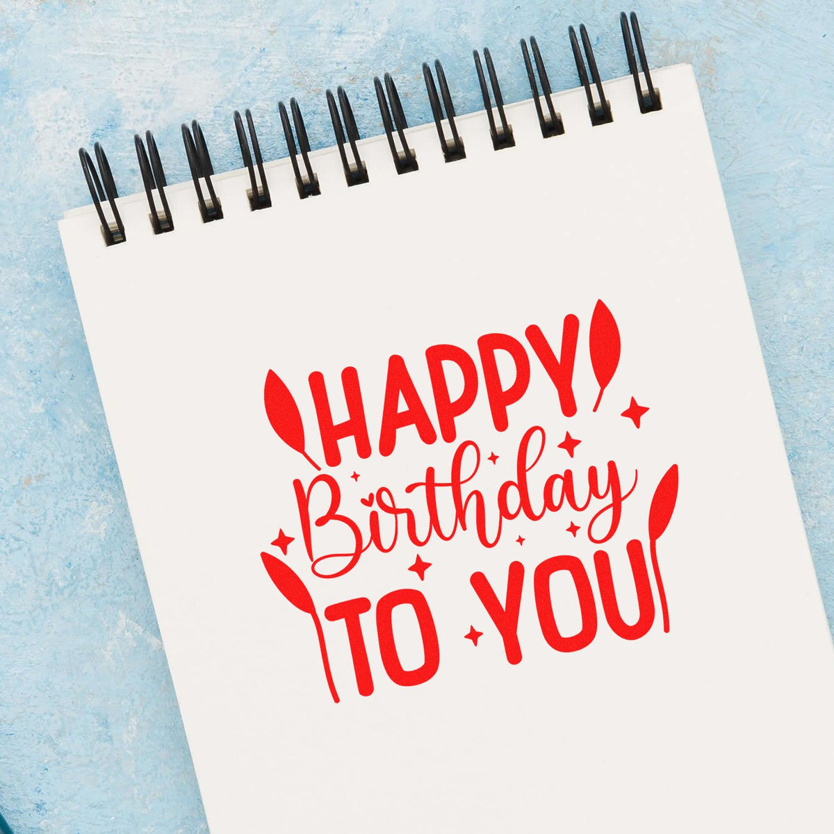 Happy Birthday To You rubber stamp shown in red ink, stamped for projects such as screen album page.