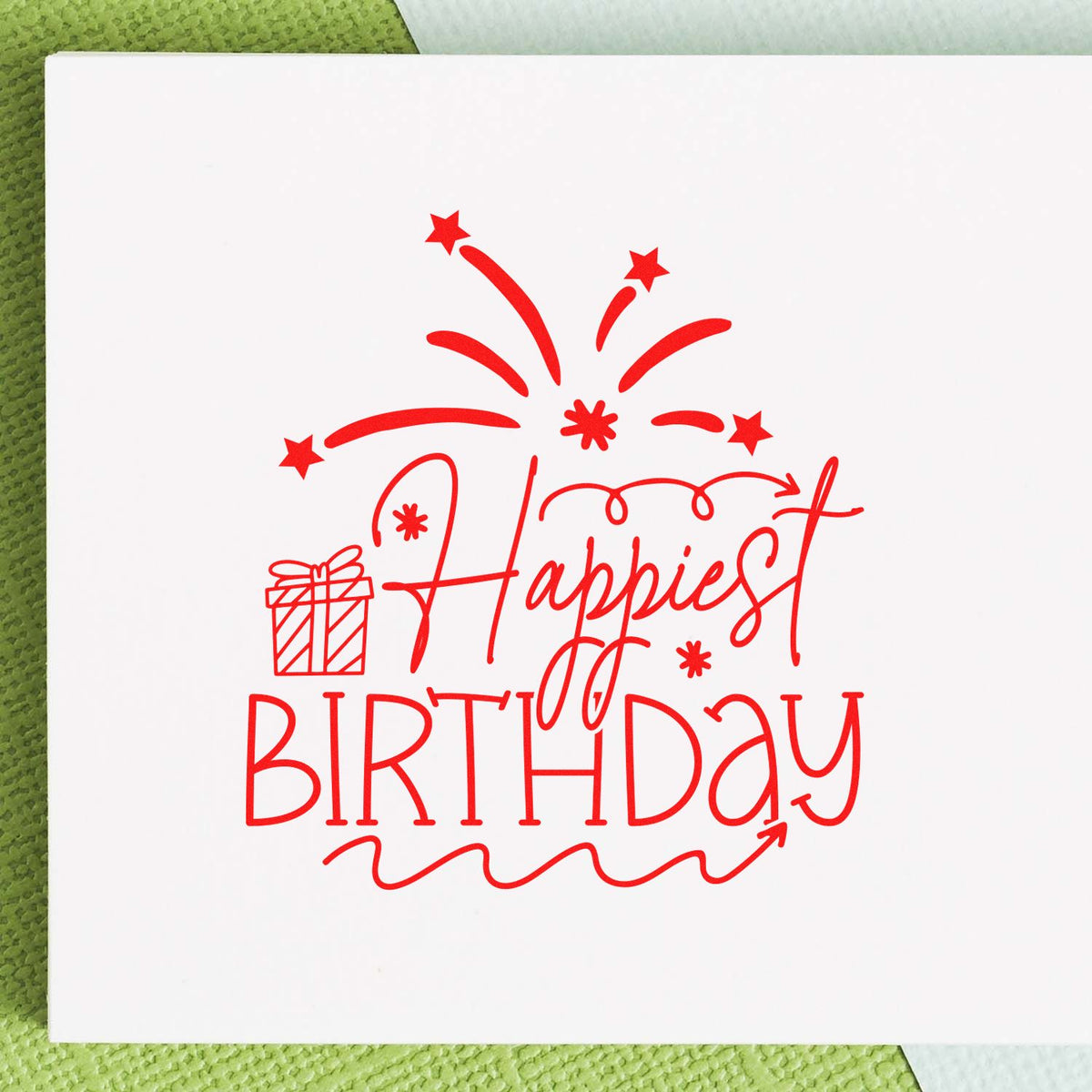 Happiest Birthday Gift Fireworks rubber stamp shown in red ink, stamped for projects such as cookout album page.