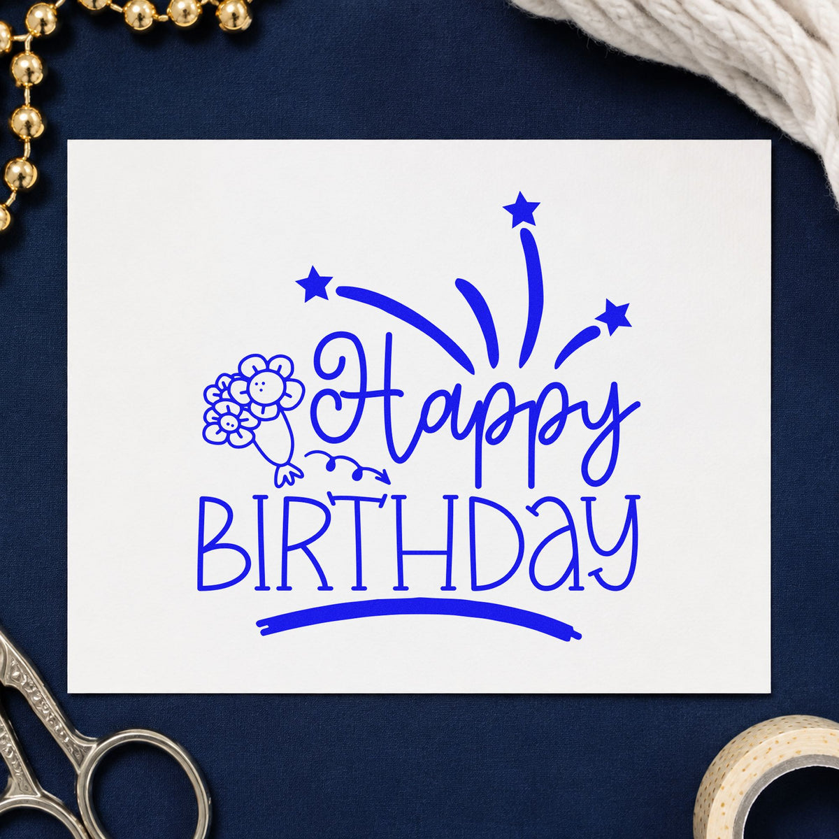 Happy Birthday Flowers Fireworks craft stamp imprinted in blue ink on paper, a design suited to framed work bench.