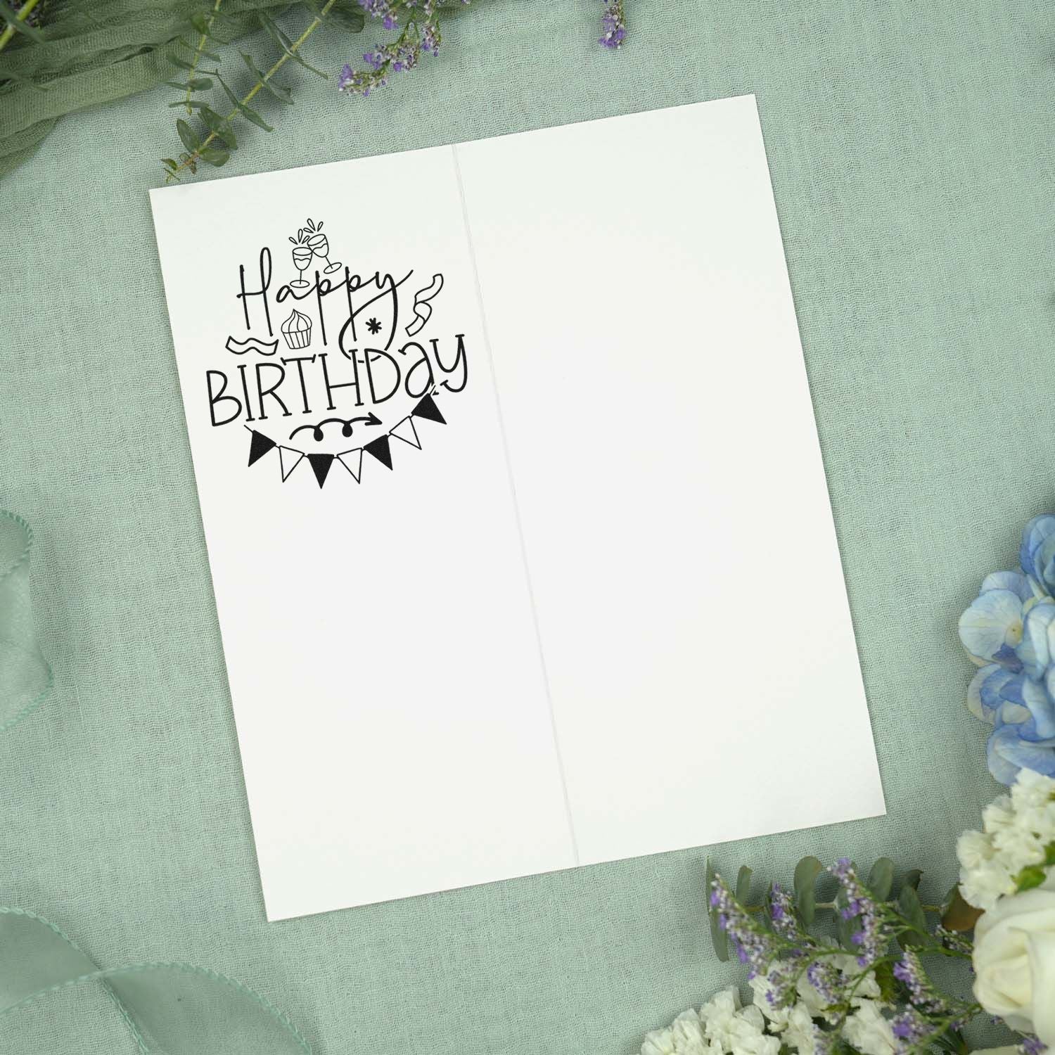 Happy Birthday rubber stamp design on a blank greeting card with festive bunting, ideal for handmade birthday cards.