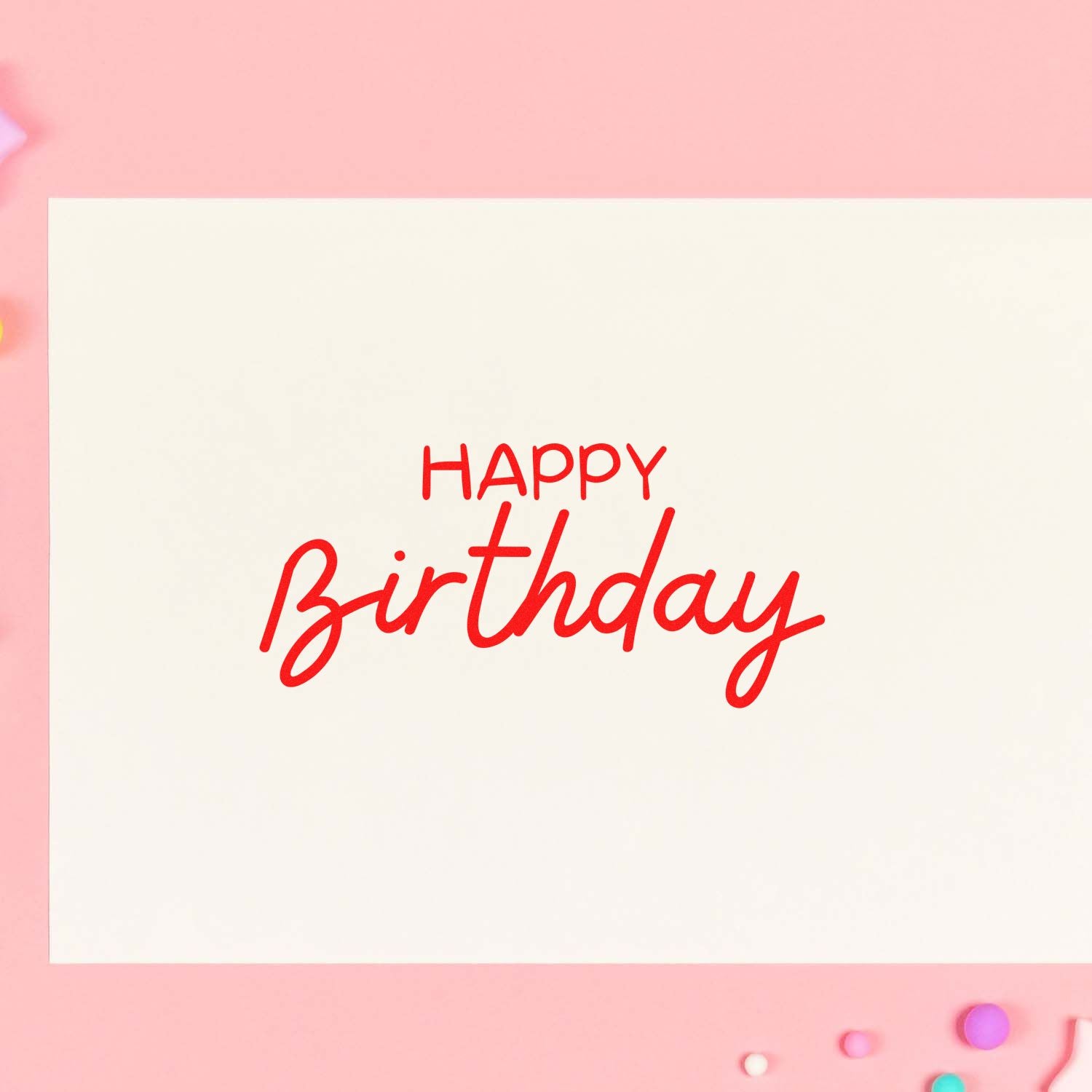 Happy Birthday rubber stamp impression on greeting card, ideal for birthday crafts and handmade card making