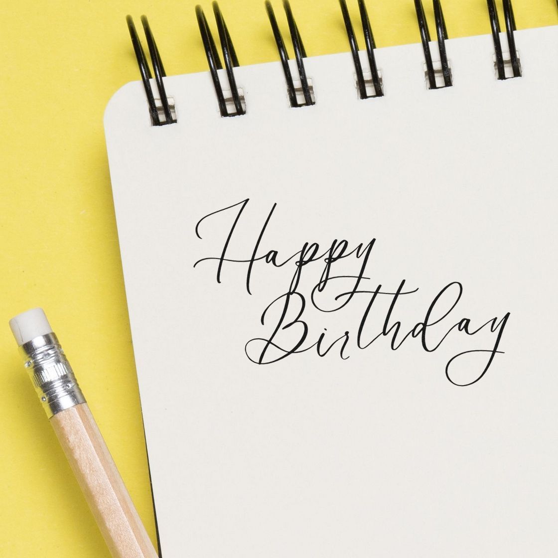 Fine Calligraphy Birthday Greeting Premium Wooden Stamp - Vintage Pro imprint stamped in black ink. Happy Birthday appears in two lines of fine, sweeping calligraphy.