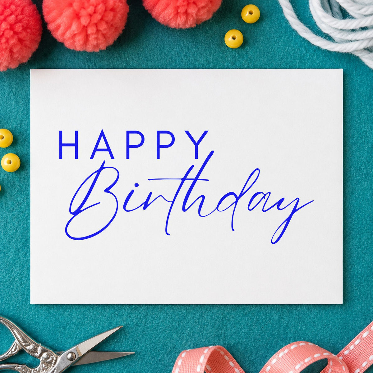 Happy Birthday Thin Lettering craft stamp in blue ink on cardstock, an easy option for cushion cover printing.