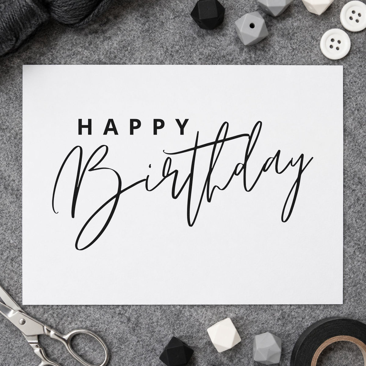 Happy Birthday Sweeping Script rubber stamp printed in black ink, ready for crossing stroke cards and similar paper crafts.