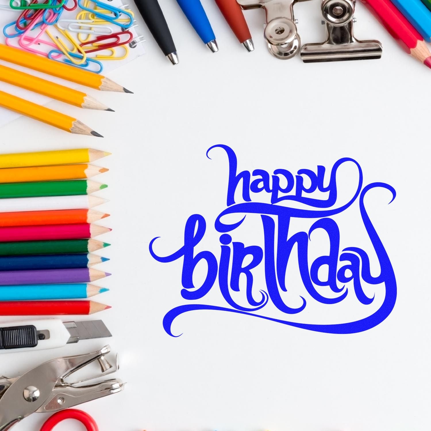Happy birthday rubber stamp design with colorful pencils, pens, and office supplies on a clean white background.