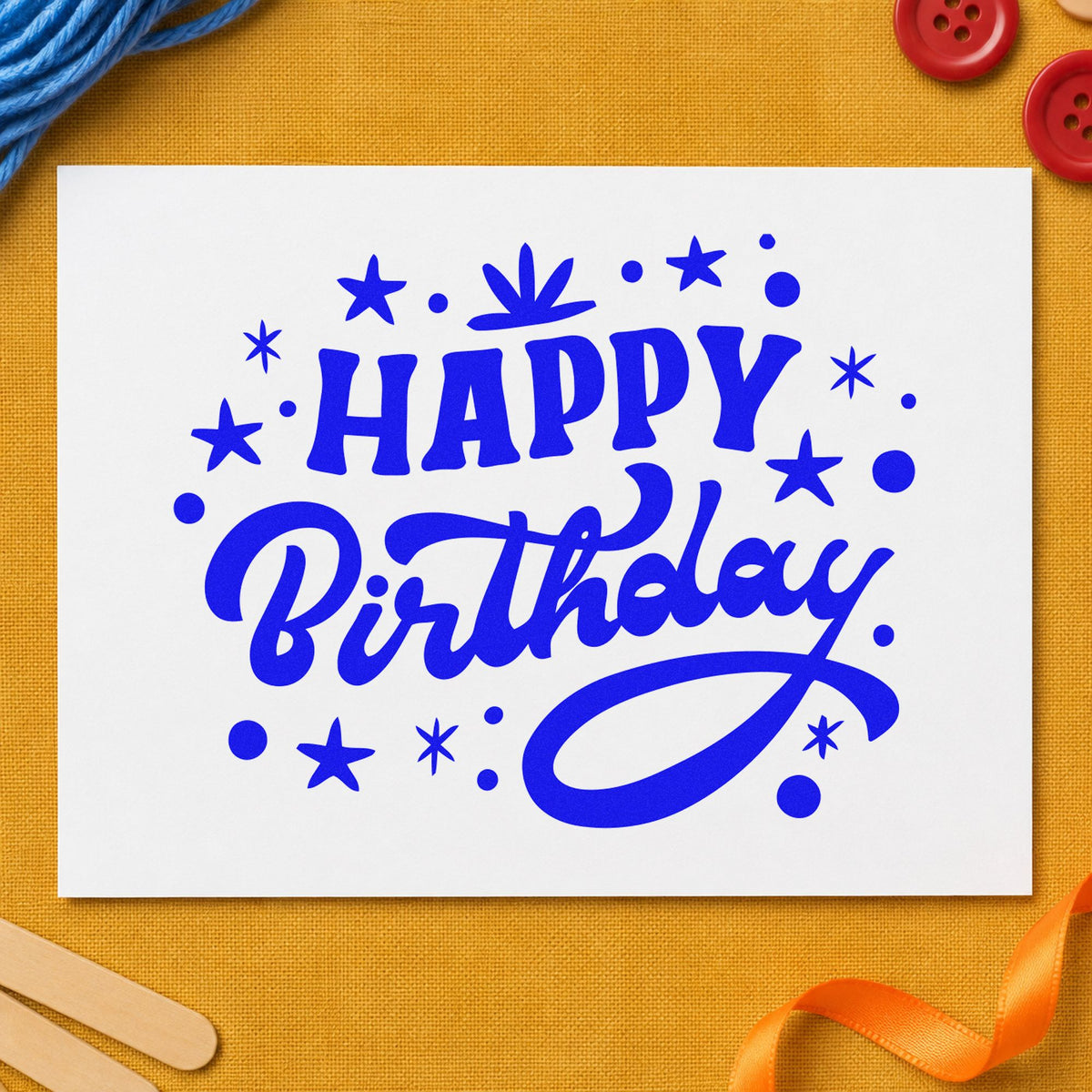 Happy Birthday Star Confetti craft stamp in blue ink on cardstock, an easy option for dome drape printing.