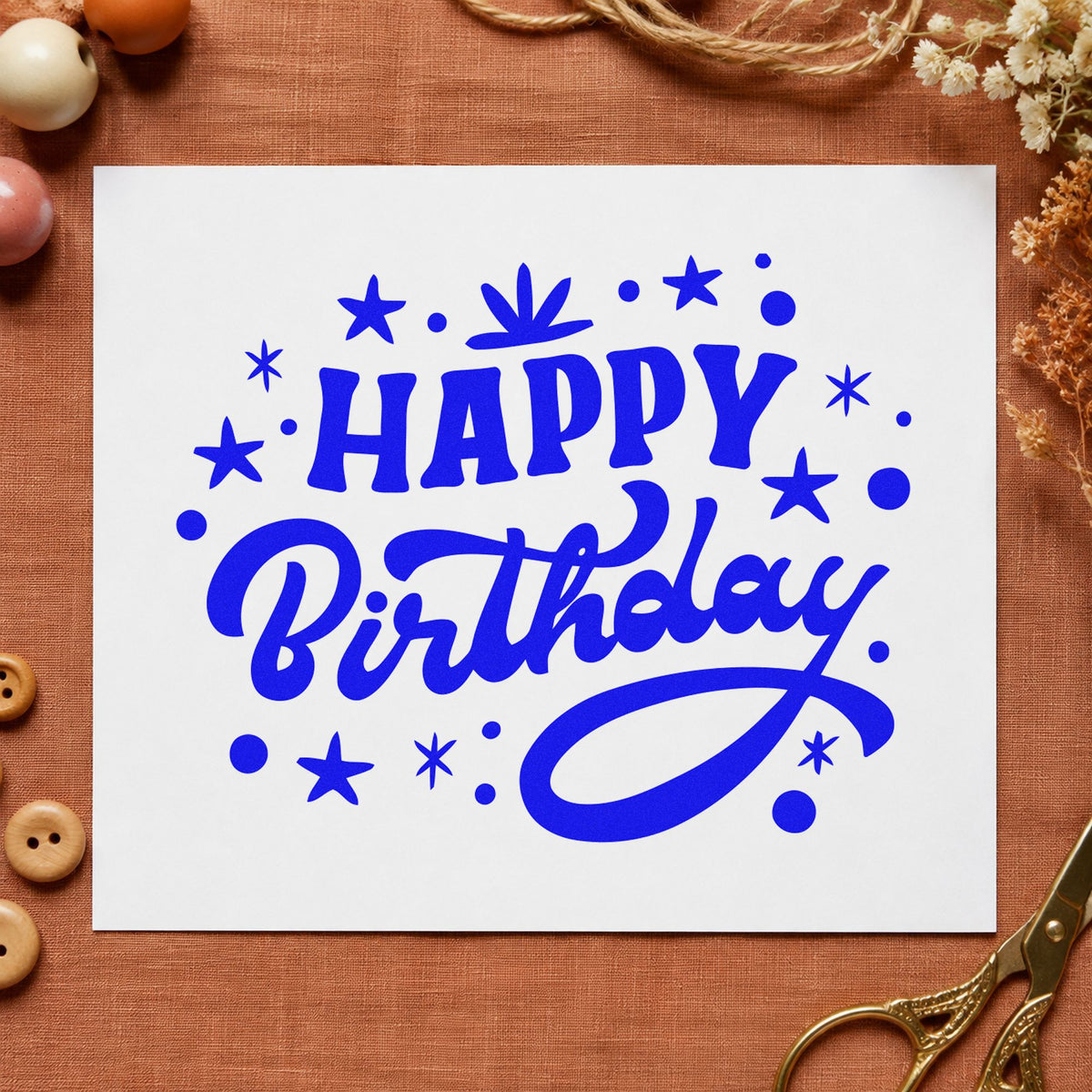 Happy Birthday Star Confetti craft stamp imprinted in blue ink on paper, a design suited to framed entry hall.