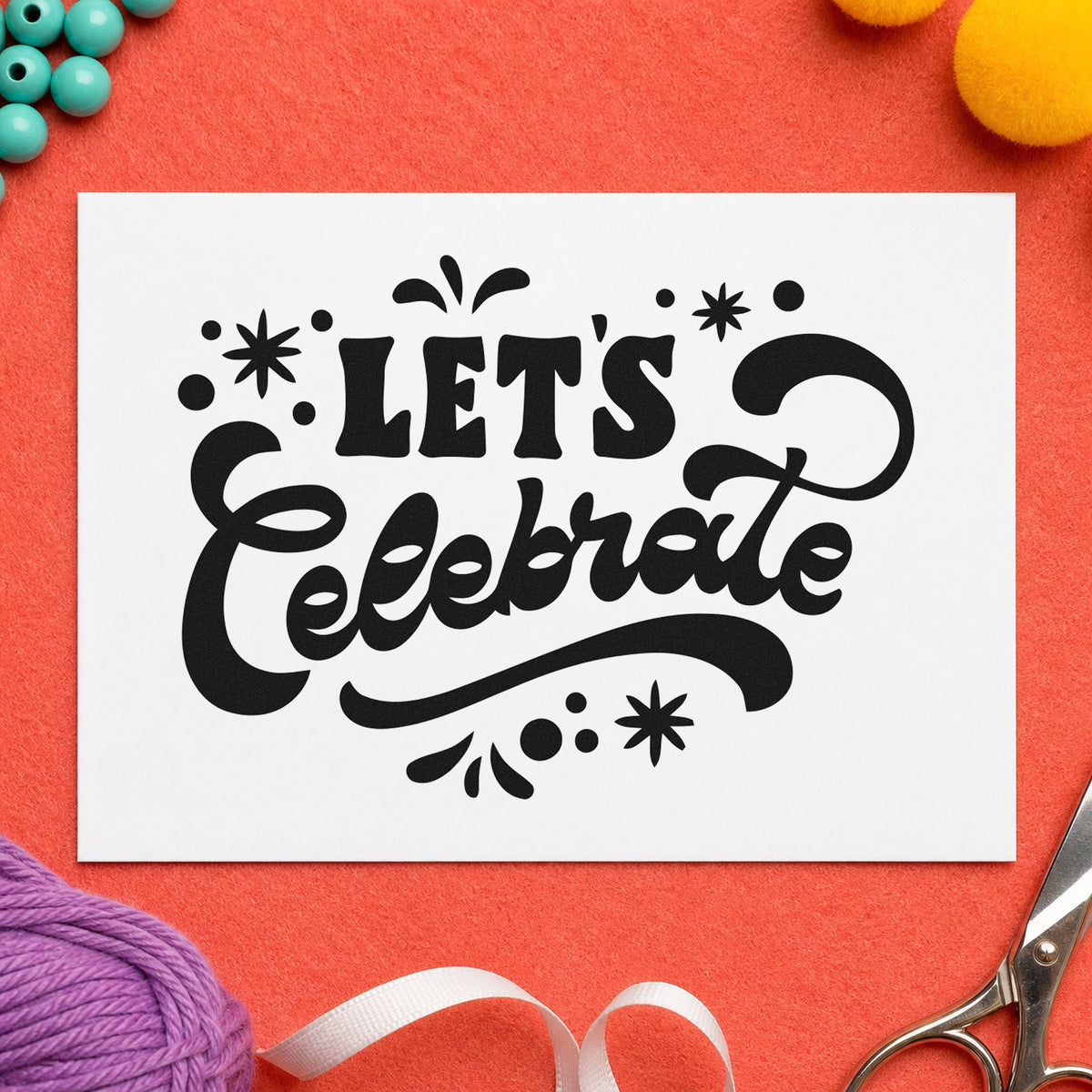 Let's Celebrate Script craft stamp in black ink on cardstock, an easy option for center year album page.