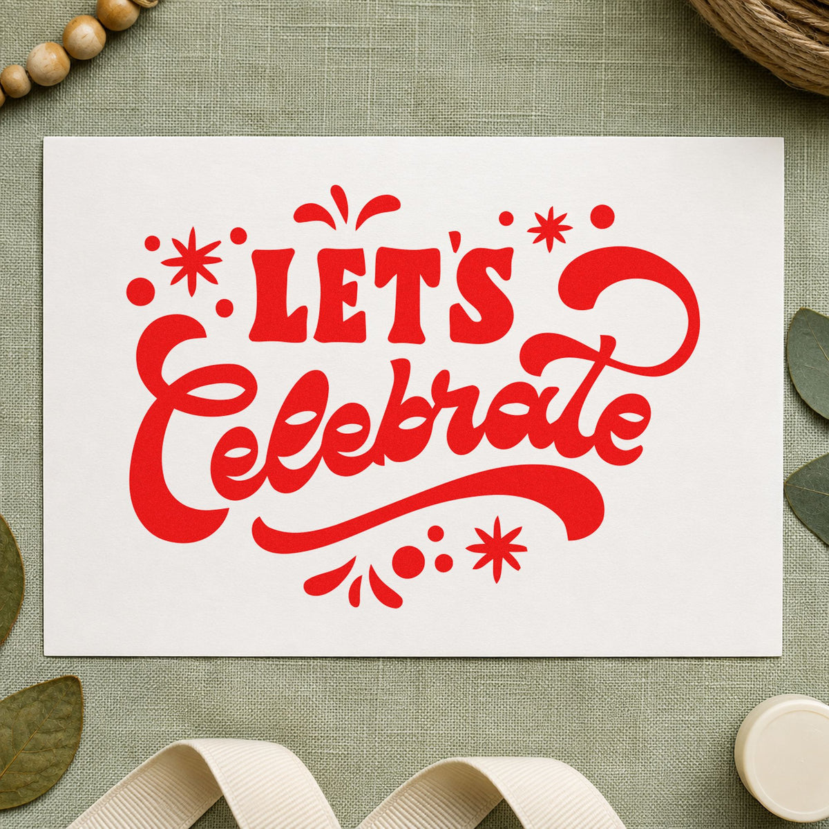 Let's Celebrate Script craft stamp imprint in red ink on a handmade project, one idea being group sign cards.