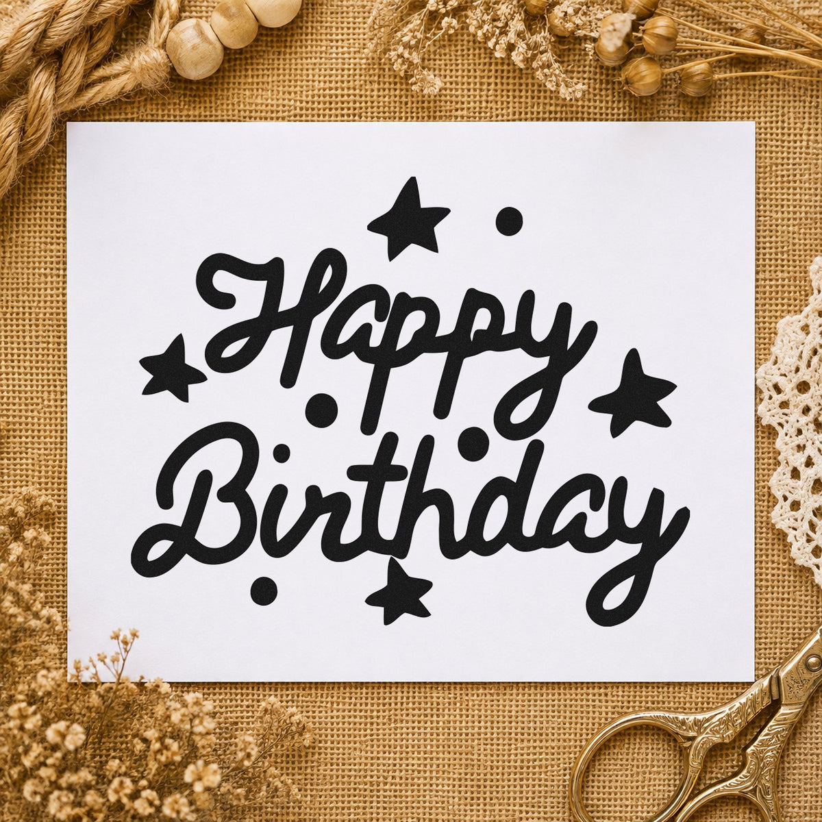 Happy Birthday Stars Dots craft stamp imprint in black ink on a handmade project, one idea being pack gift tags.