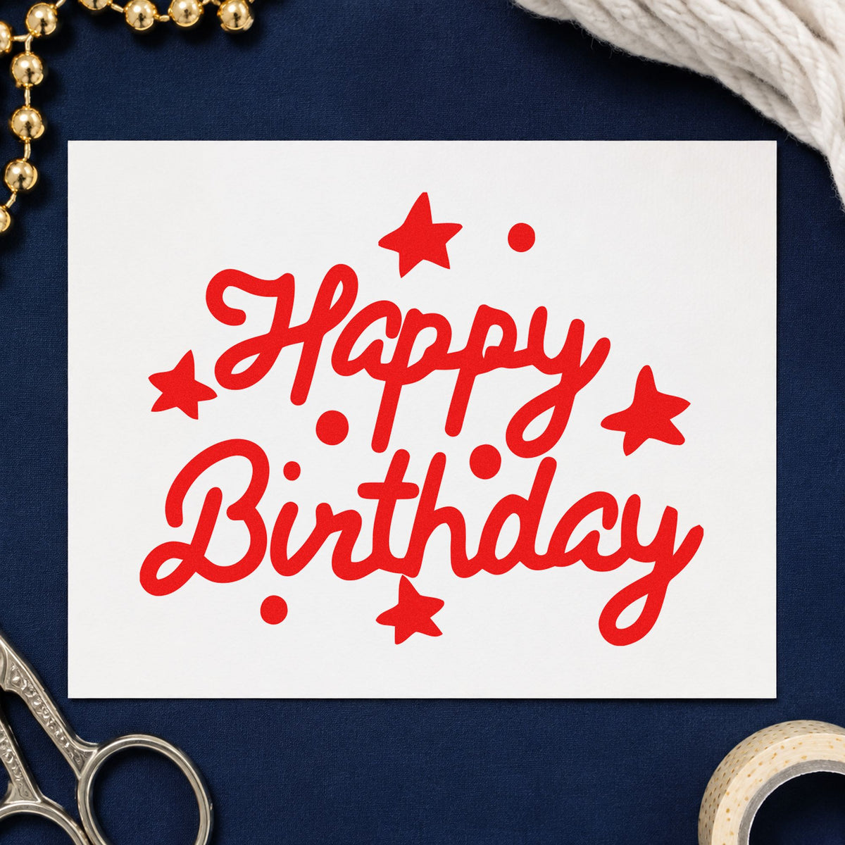 Happy Birthday Stars Dots craft stamp imprint in red ink on a handmade project, one idea being night game cards.