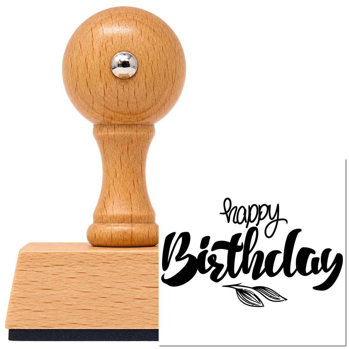 Leaf-Sprig Birthday Wishes Vintage Pro rubber stamp in European beech wood with a round knob handle, shown beside its black imprint.