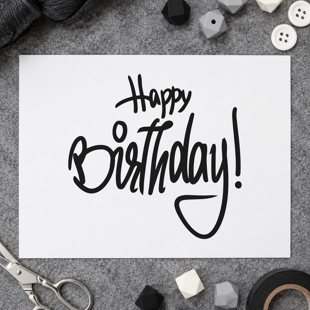 Happy Birthday Tall Script rubber stamp printed in black ink, ready for energetic loop cards and similar paper crafts.