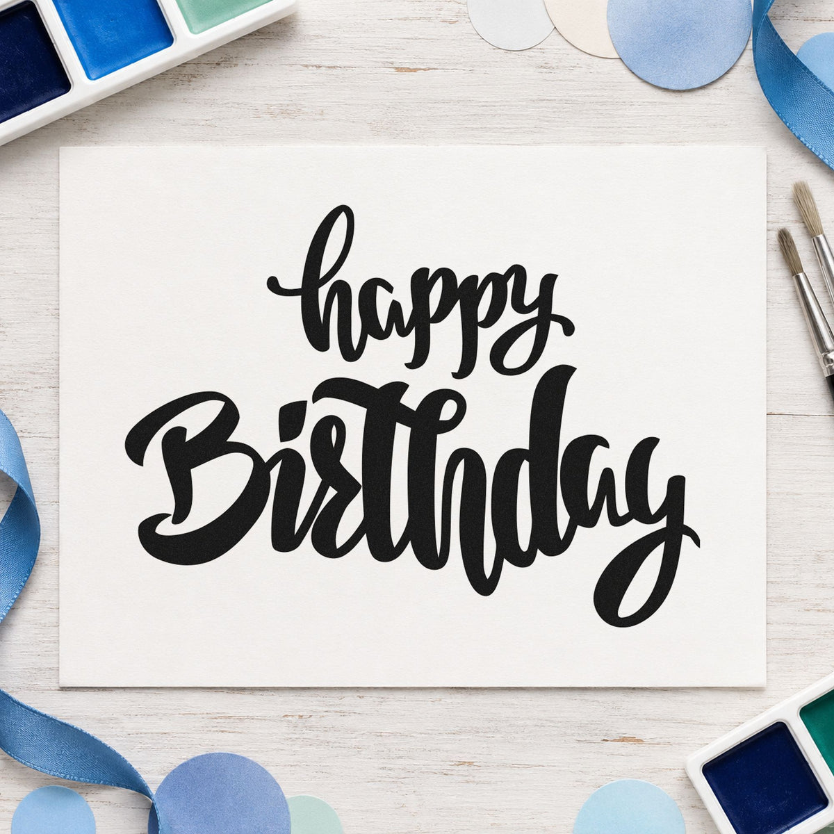 Happy Birthday Heavy Script craft stamp imprint in black ink on a handmade project, one idea being drink voucher tags.
