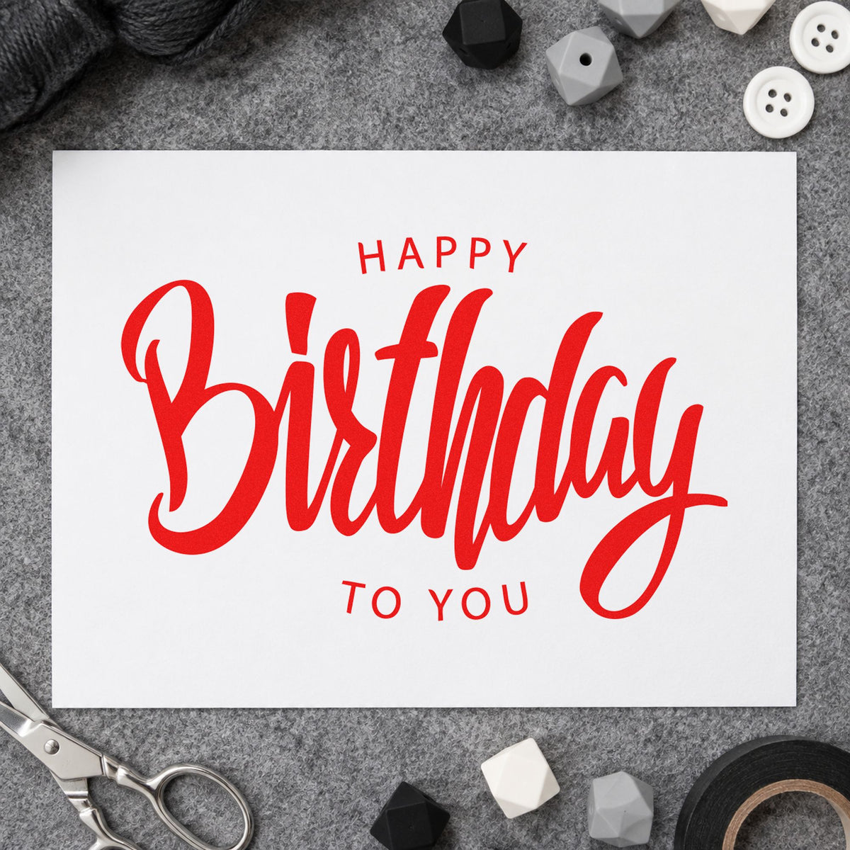 Happy Birthday To You rubber stamp shown in red ink, stamped for projects such as bin prize labels.