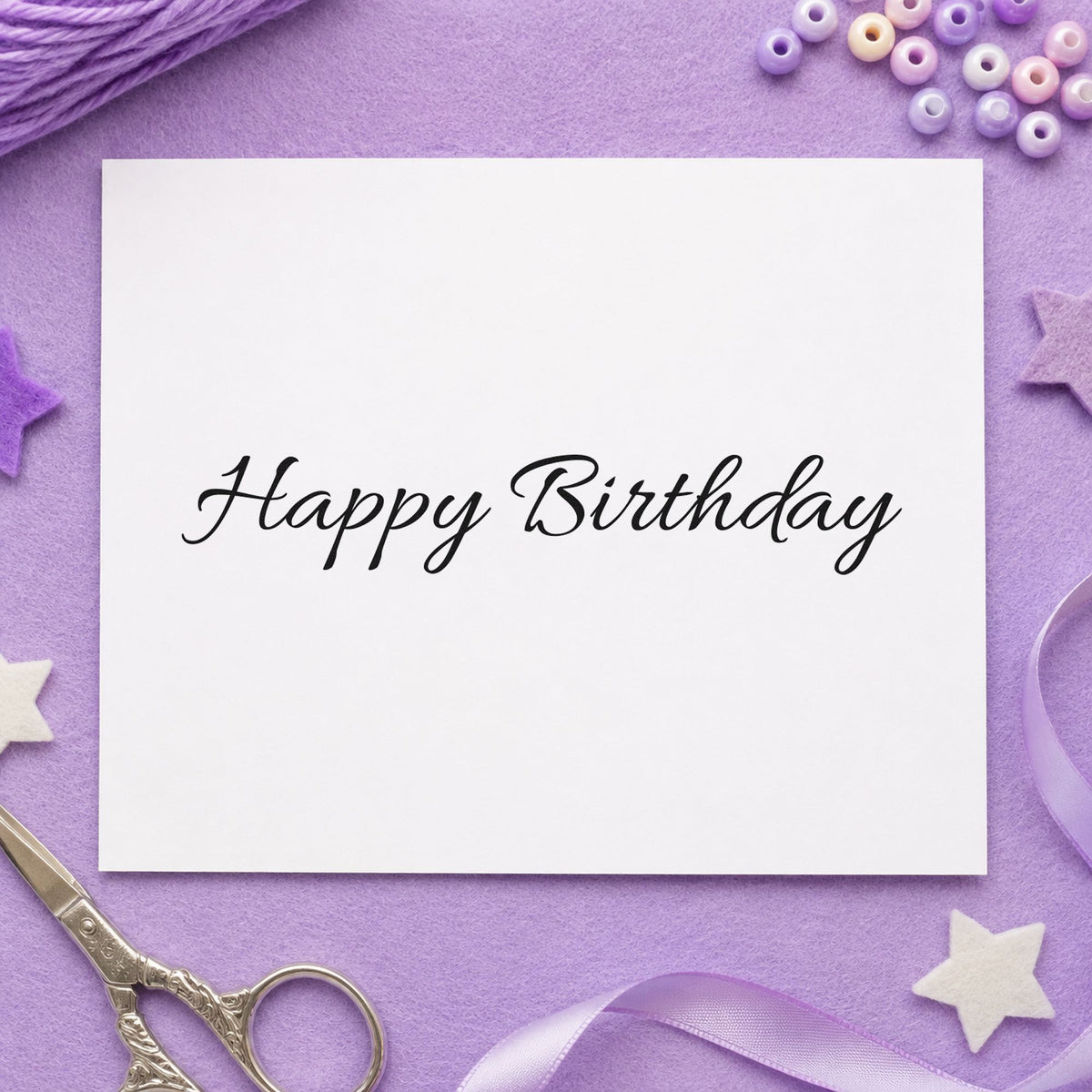 Happy Birthday Fine Script craft stamp imprint in black ink on a handmade project, one idea being tray gift tags.
