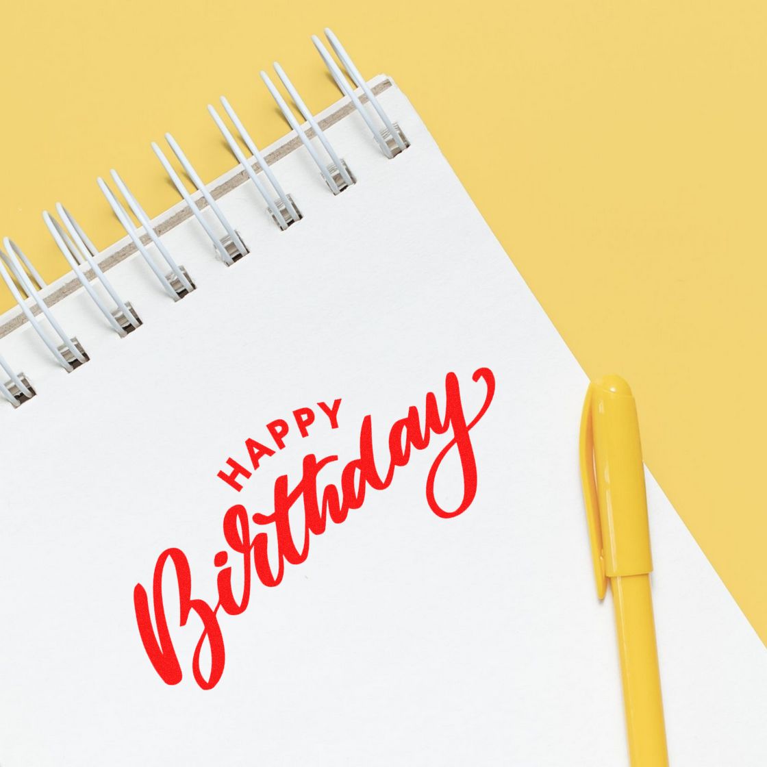 Happy Birthday Arched Heading rubber stamp shown in red ink, stamped for projects such as display year album page.