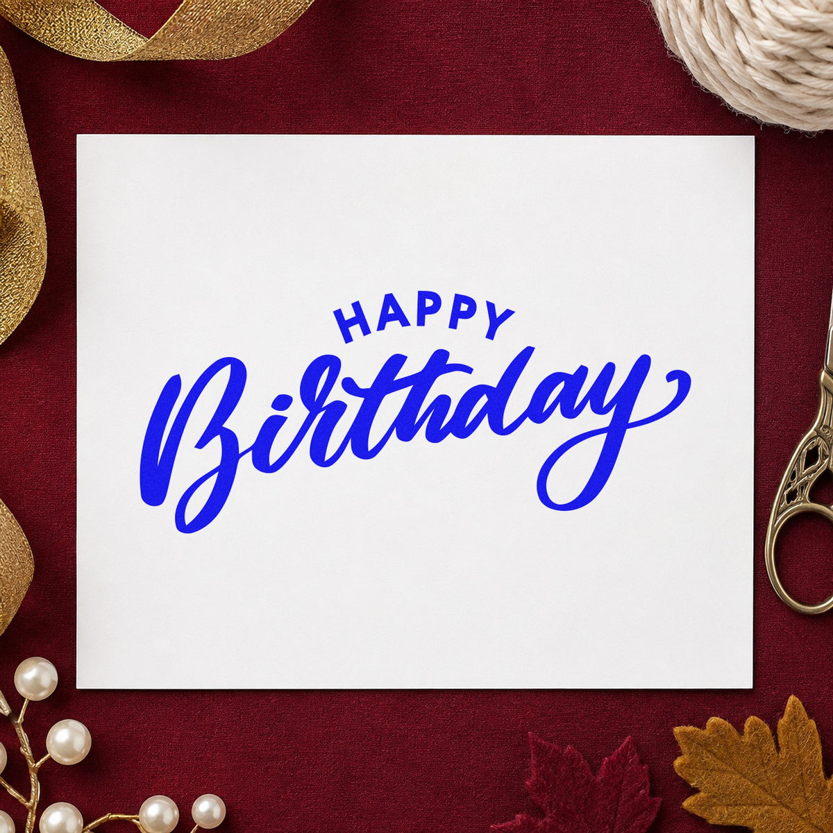 Happy Birthday Arched Heading craft stamp in blue ink on cardstock, an easy option for window cloth printing.