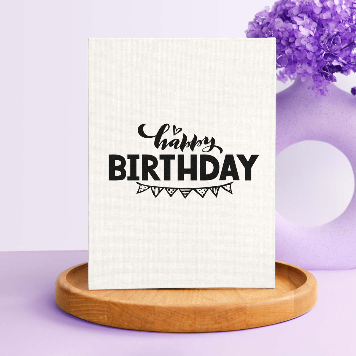 Happy Birthday Pennant Underline Premium Wood-Mounted Stamp - Vintage Pro imprint stamped in black ink. Small script Happy sits above bold BIRTHDAY with patterned pennant bunting below.