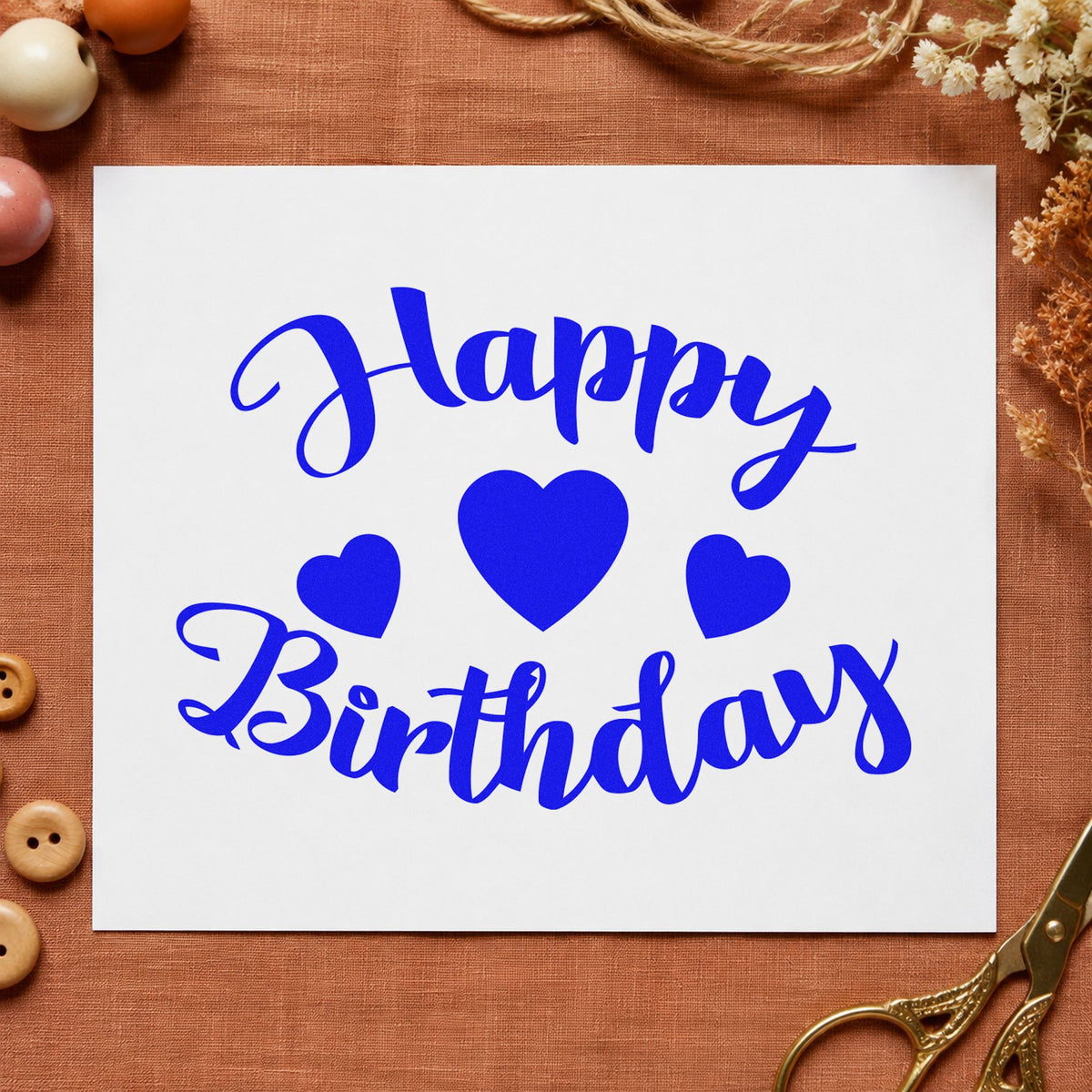 Happy Birthday Three Hearts craft stamp imprinted in blue ink on paper, a design suited to framed hall gallery.
