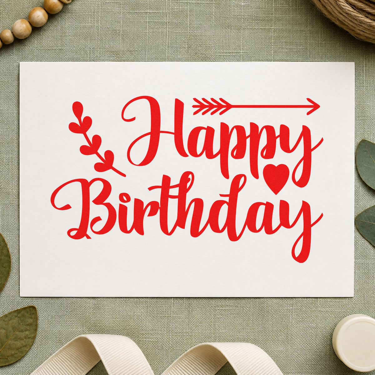 Birthday Arrow Leaf Hearts craft stamp imprint in red ink on a handmade project, one idea being route brief cards.