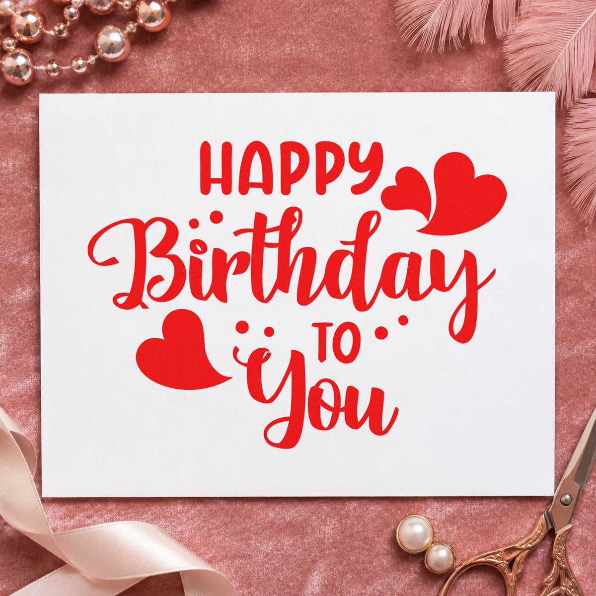 Happy Birthday To You craft stamp imprint in red ink on a handmade project, one idea being year note cards.
