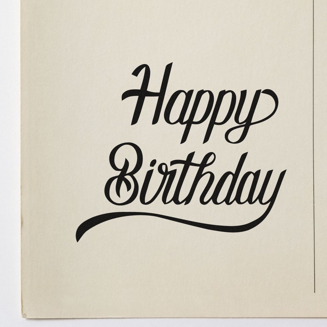 Premium Wooden Happy Birthday Long Underline Script Lettering Stamp - Vintage Pro imprint stamped in black ink. Happy Birthday appears in elegant thick script with a long sweeping underline.