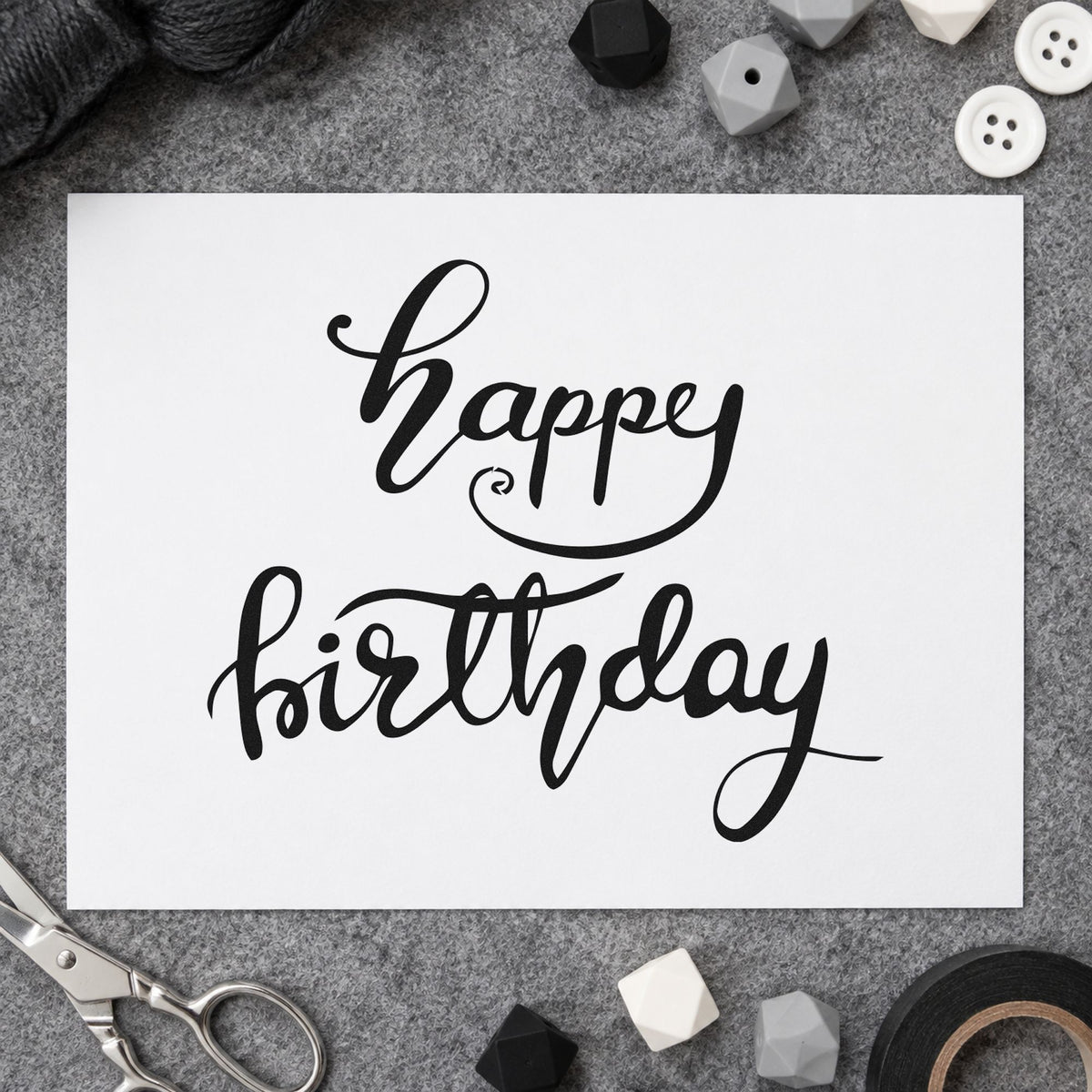 Happy Birthday Fine Flourishes craft stamp imprint in black ink on a handmade project, one idea being sample set gift tags.