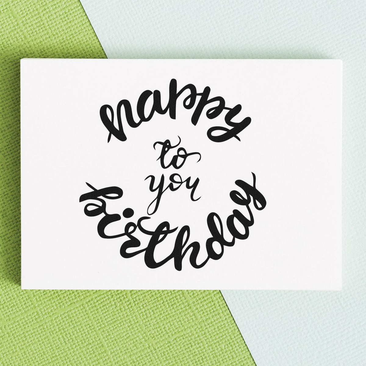 Birthday To You Curved Lettering Premium Wooden Stamp - Vintage Pro imprint stamped in black ink. happy and birthday curve around the smaller central words to you.
