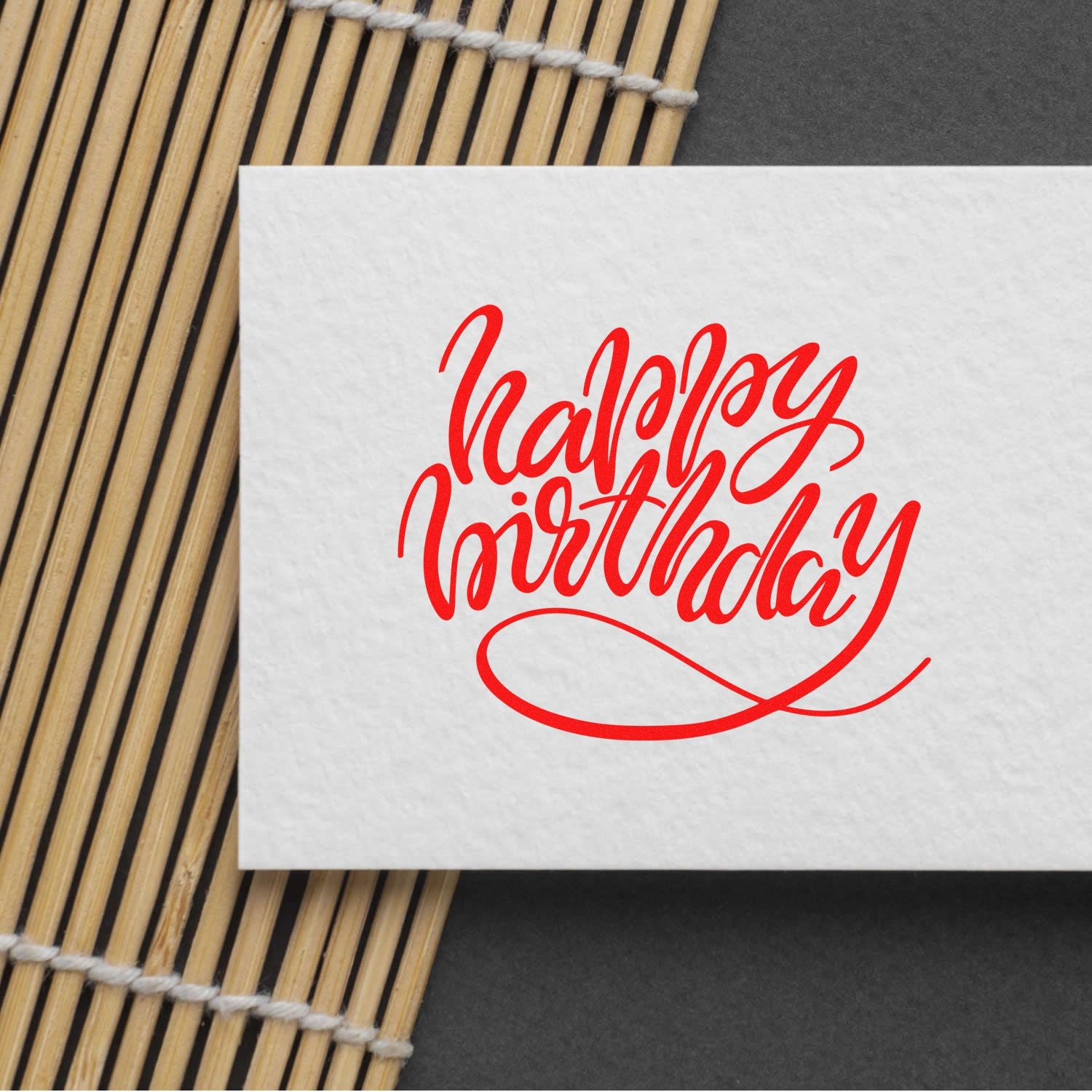Red happy birthday rubber stamp design on white paper for custom birthday cards and handmade invitations.