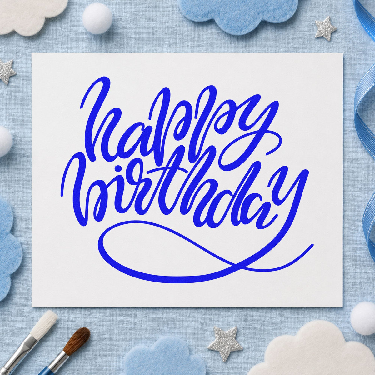 Happy Birthday Loop Underline craft stamp in blue ink on cardstock, an easy option for stage drape printing.