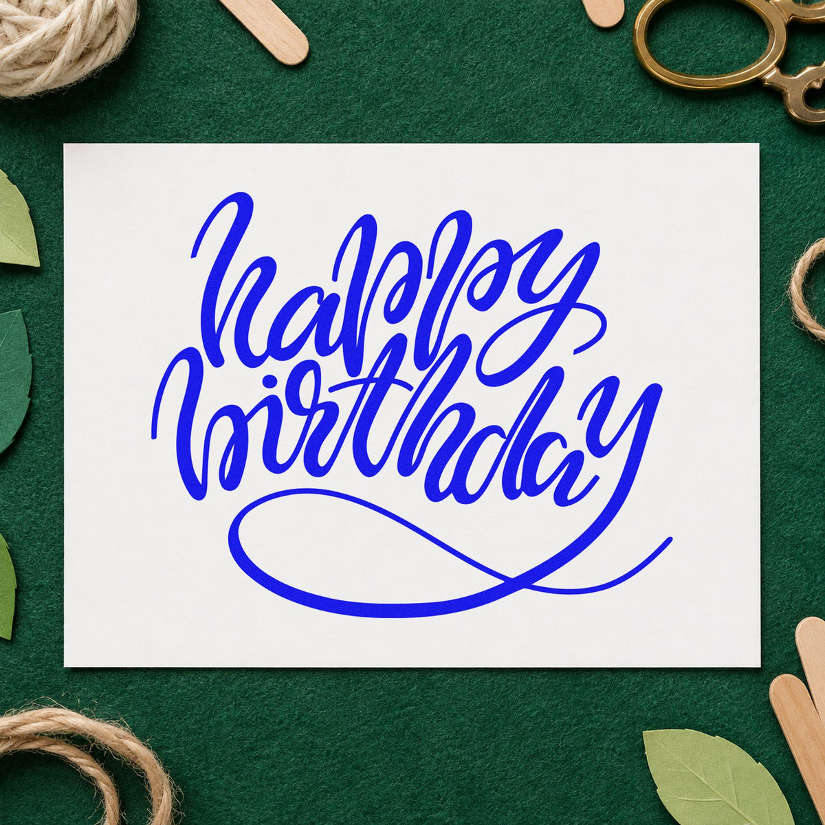 Happy Birthday Loop Underline craft stamp imprinted in blue ink on paper, a design suited to framed club entry.