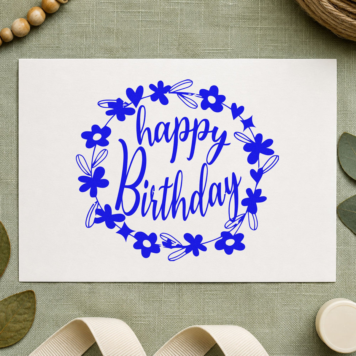 Birthday Flower Heart Wreath craft stamp imprinted in blue ink on paper, a design suited to framed studio corner.