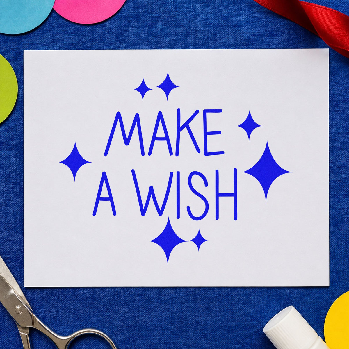Make A Wish Sparkles craft stamp in blue ink on cardstock, an easy option for pillowcase printing.