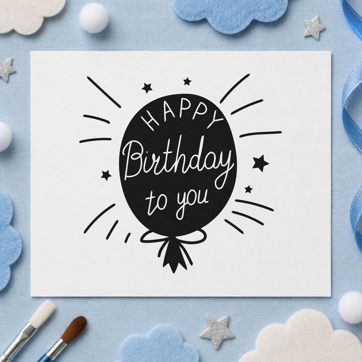 Birthday To You Balloon craft stamp imprint in black ink on a handmade project, one idea being bunch gift tags.